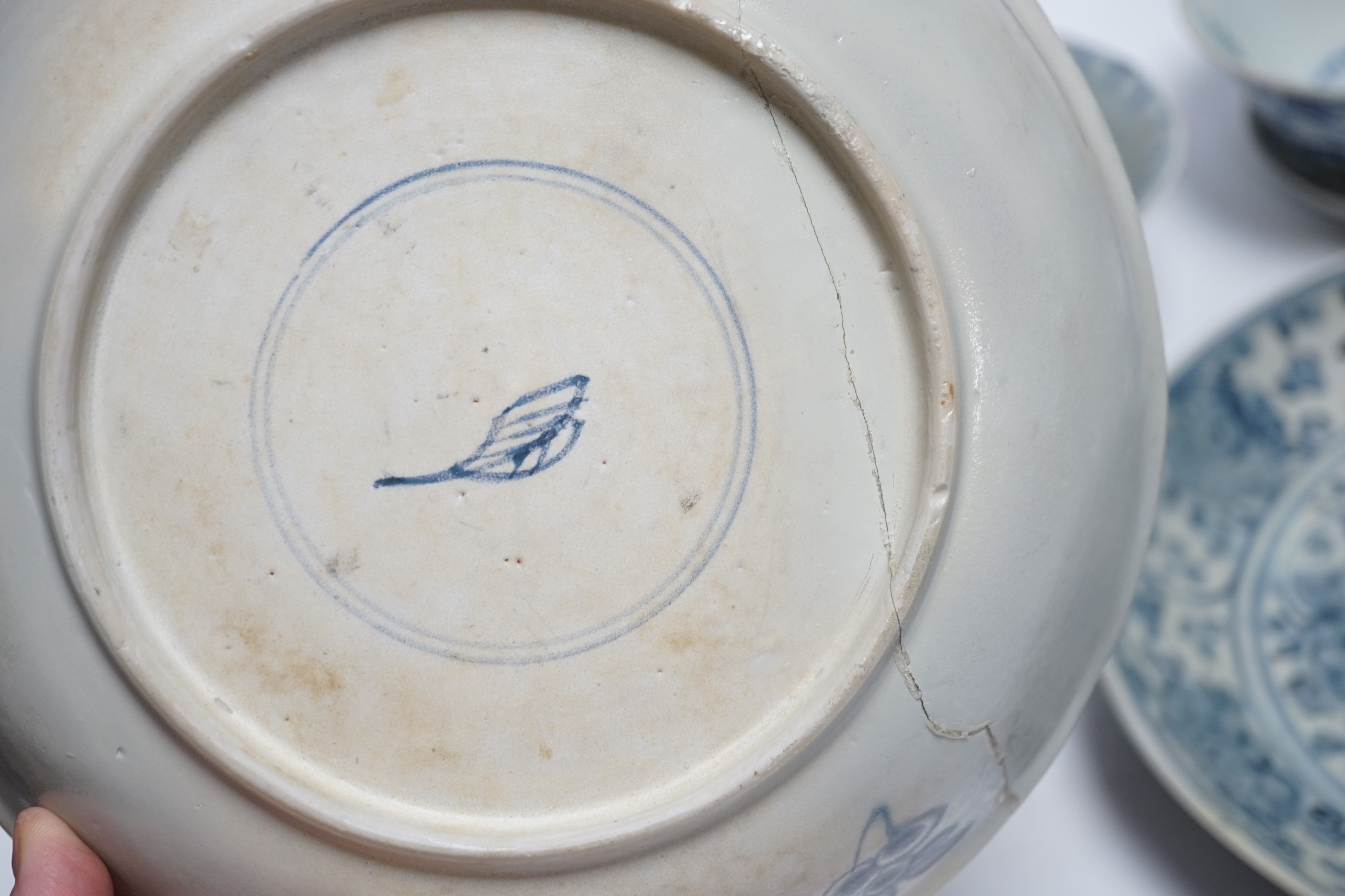 Chinese Ming dynasty shipwreck ceramics - three blue and white pottery bowls and three dishes, largest 25cm diameter